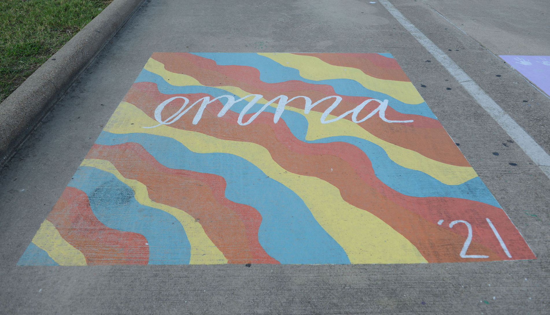 A&M Consolidated HS painted parking spots